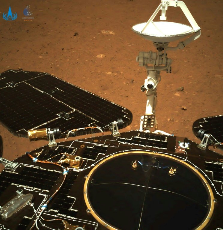 AFP  This picture released on May 19, 2021, by the China National Space Administration (CNSA) via CNS shows an image taken by the navigation camera of China's Zhurong rover on the surface of Mars, showing the rover's solar panels and antenna, after it landed on Mars on May 15, 2021.